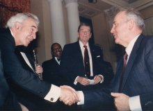 President Gorbachev greeting Dave (with President Reagan looking on) to a dinner held in the US Ambassadors House, Moscow during the summit of 1988.